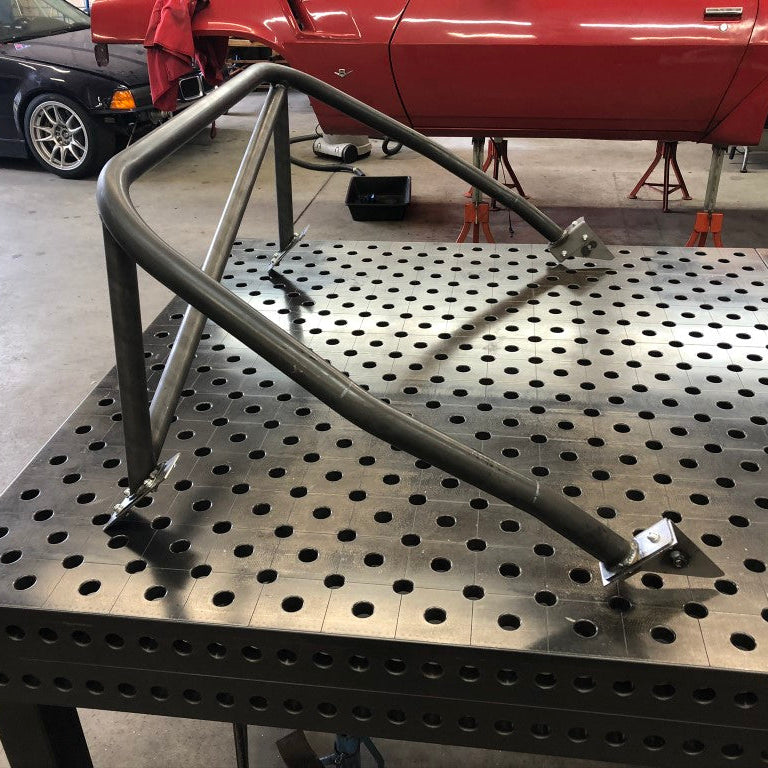 Schroefkooi voor Datsun 240Z, rolbeugel achter de stoelen.